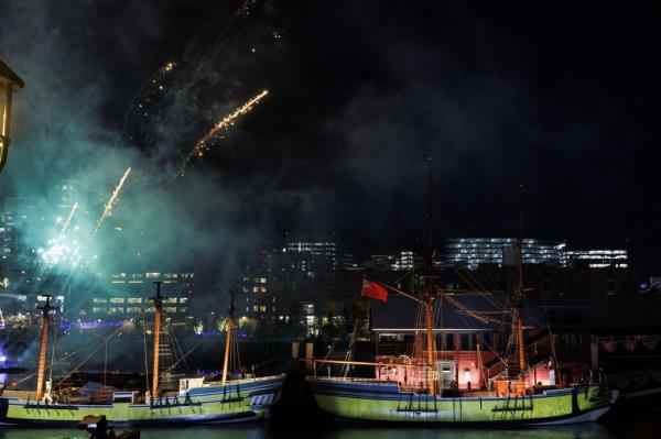 Fireworks go off over two boats, the "Beaver" (left) and the "Eleanore" during Saturday's celebrations.