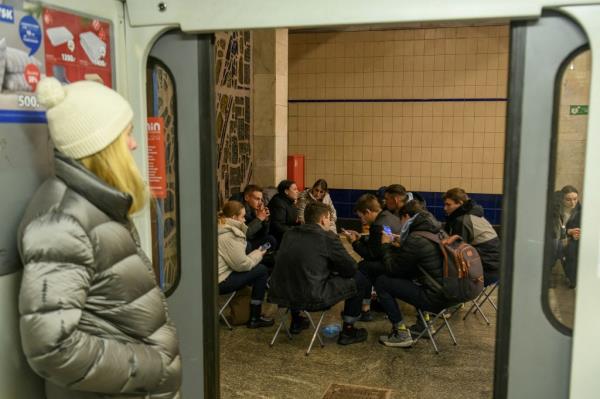 Ukrainians take refuge in subway station during Russian attack