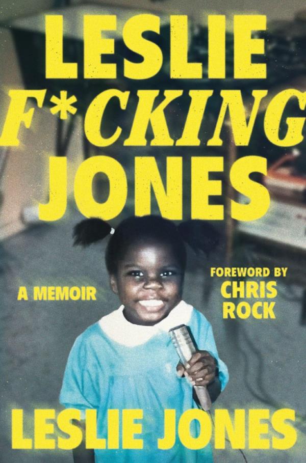 Cover of Leslie Jones' book "Leslie F*cking Jones" showing her with mic as a little girl.