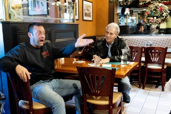 Nick Iannarone, 41, a patron at The Grasshopper in Cedar Grove, discusses Tommy DeVito and Aaron Rodgers