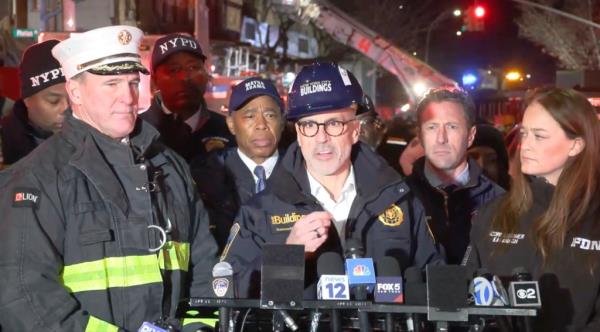 Dept. of Building Commissio<em></em>ner James Oddo (third from left) speaks to the media after the incident on Dec. 11.
